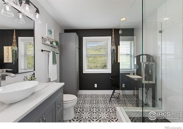 4721 Arthur Mae Ln, Laporte, CO 80535 - full bath featuring healthy amount of natural light, vanity, and a stall shower