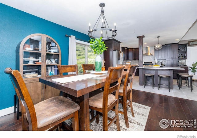 4721 Arthur Mae Ln, Laporte, CO 80535 - dining area featuring wood finished floors and a chandelier