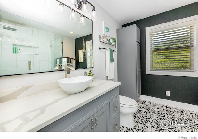 4721 Arthur Mae Ln, Laporte, CO 80535 - full bath featuring a stall shower, vanity, and toilet