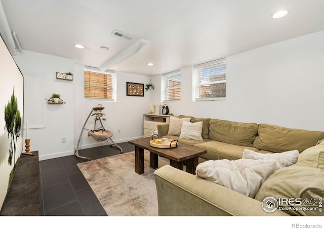 701 Mathews St, Fort Collins, CO 80524 - living area with recessed lighting, baseboards, and dark tile patterned floors