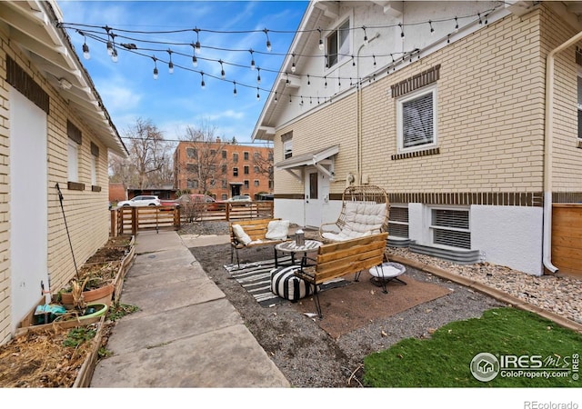 701 Mathews St, Fort Collins, CO 80524 - view of patio featuring a gate and an outdoor living space