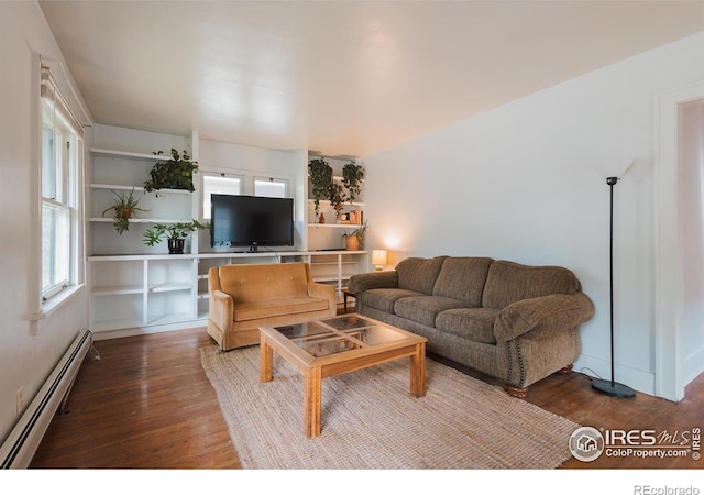 416 E Elizabeth St, Fort Collins, CO 80524 - living area with baseboard heating and wood finished floors