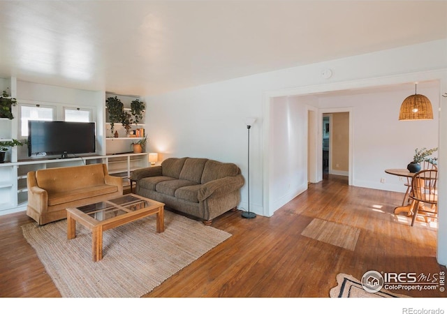 416 E Elizabeth St, Fort Collins, CO 80524 - living area featuring wood finished floors and baseboards
