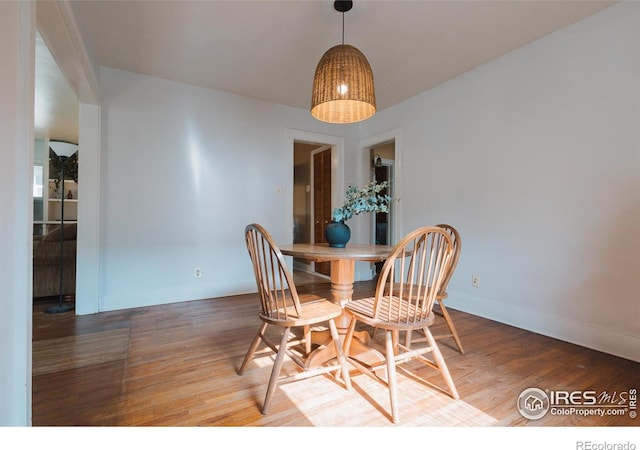 416 E Elizabeth St, Fort Collins, CO 80524 - dining area with wood finished floors and baseboards