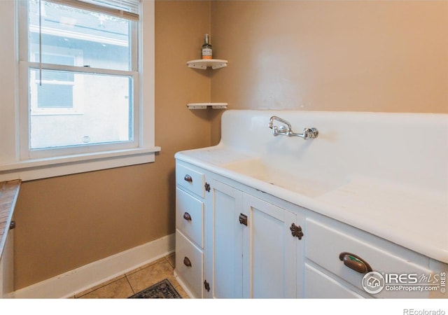 416 E Elizabeth St, Fort Collins, CO 80524 - bathroom with tile patterned floors and baseboards