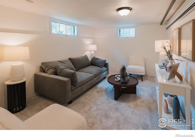 416 E Elizabeth St, Fort Collins, CO 80524 - carpeted living area featuring a wall unit AC