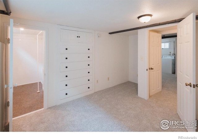 416 E Elizabeth St, Fort Collins, CO 80524 - unfurnished bedroom with washer / clothes dryer and light colored carpet