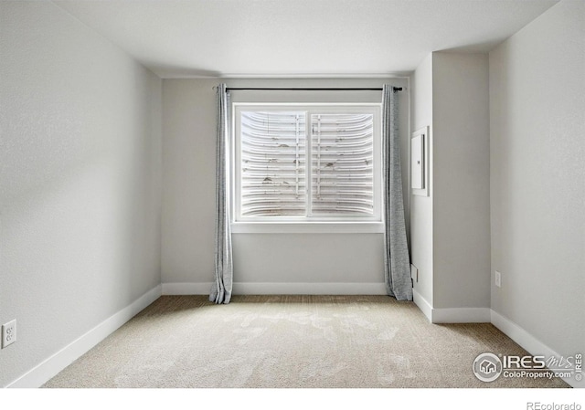 518 Hoyt Ln, Lafayette, CO 80026 - unfurnished room featuring carpet and baseboards