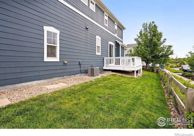 518 Hoyt Ln, Lafayette, CO 80026 - view of home's exterior with a wooden deck and central AC unit