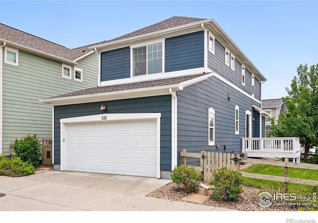 518 Hoyt Ln, Lafayette, CO 80026 - view of property exterior with an attached garage and concrete driveway