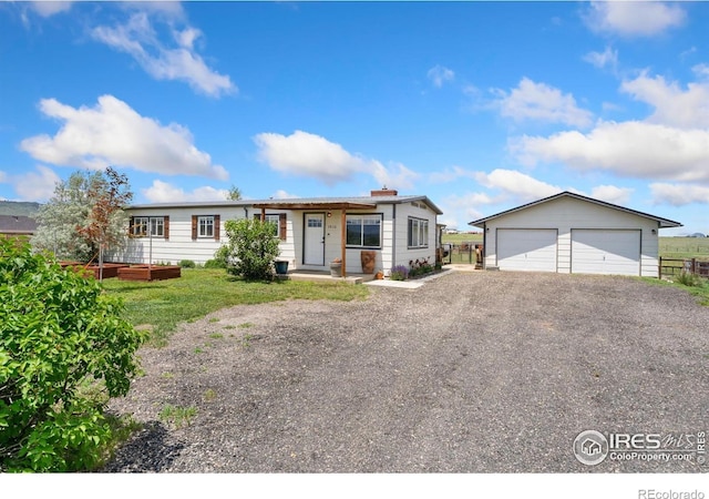 2836 W County Road 60e, Fort Collins, CO 80524 - single story home featuring a detached garage and an outbuilding