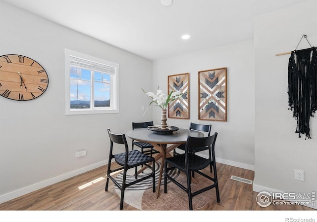 2836 W County Road 60e, Fort Collins, CO 80524 - dining room featuring wood finished floors, baseboards, and recessed lighting