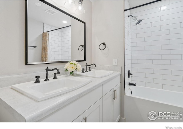 2836 W County Road 60e, Fort Collins, CO 80524 - bathroom featuring double vanity and shower / bath combo