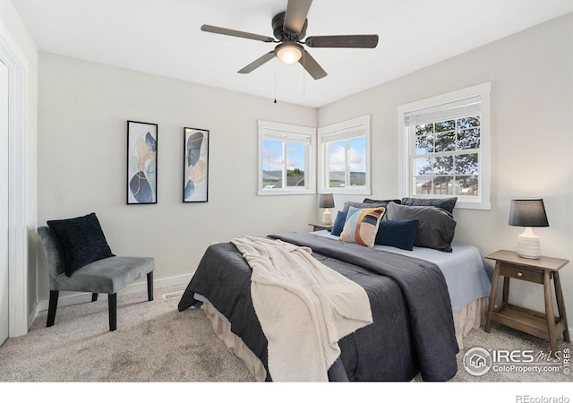 2836 W County Road 60e, Fort Collins, CO 80524 - bedroom featuring light carpet, baseboards, and a ceiling fan