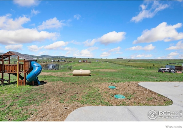 2836 W County Road 60e, Fort Collins, CO 80524 - view of yard with a playground and a rural view