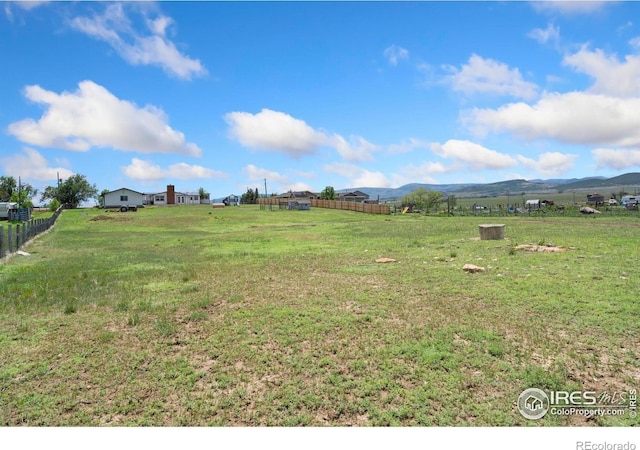 2836 W County Road 60e, Fort Collins, CO 80524 - view of yard with a mountain view and a view of rural / pastoral area