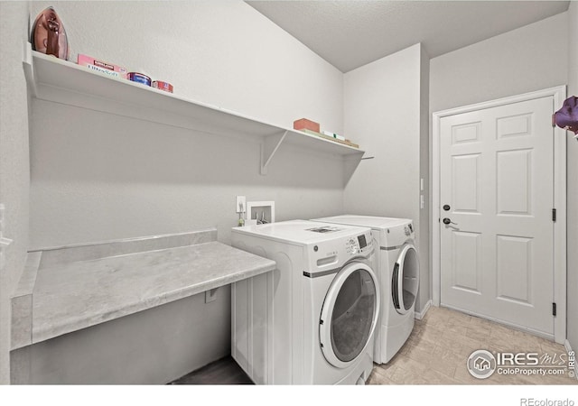 13445 Kearney St, Thornton, CO 80602 - laundry room with separate washer and dryer and baseboards
