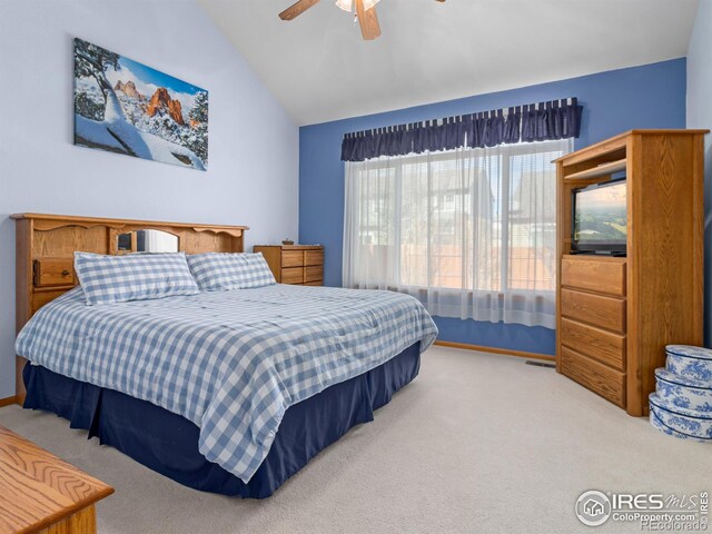 1536 Goshawk Dr, Longmont, CO 80504 - carpeted bedroom featuring vaulted ceiling, ceiling fan, and baseboards