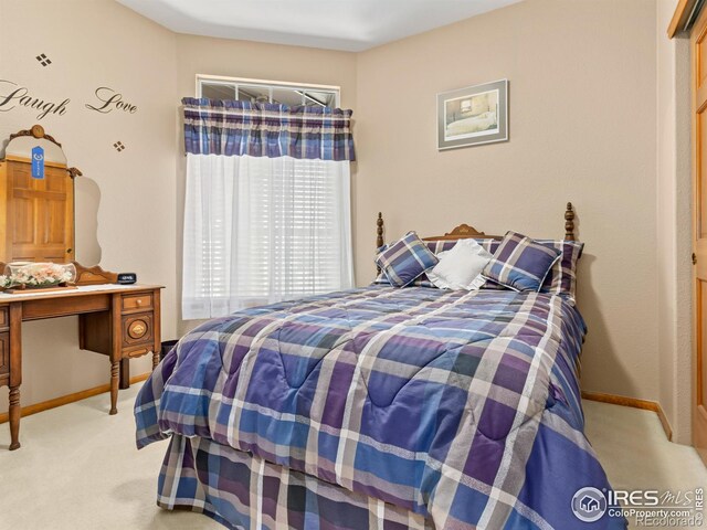 1536 Goshawk Dr, Longmont, CO 80504 - bedroom with light colored carpet and baseboards