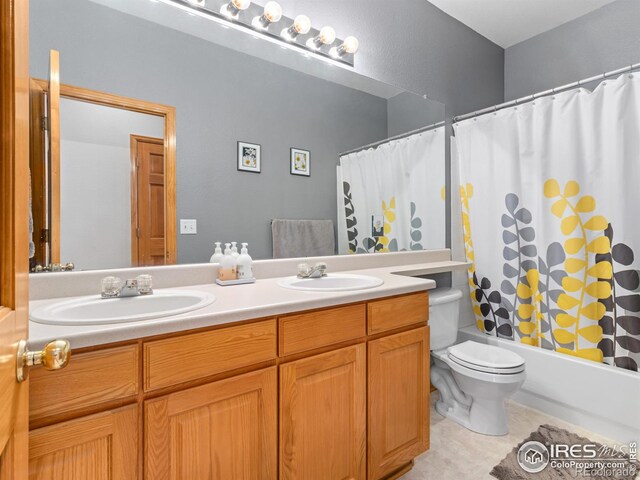 1536 Goshawk Dr, Longmont, CO 80504 - full bath with double vanity, toilet, and shower / tub combo