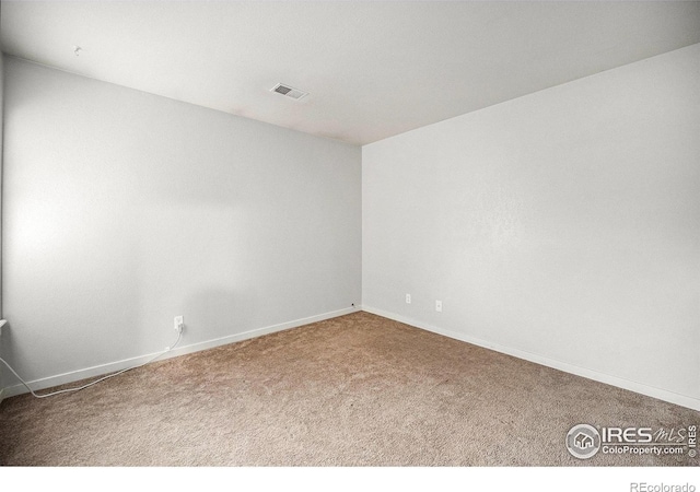 225 E 8th Ave Unit C-19, Longmont, CO 80504 - empty room with carpet and baseboards