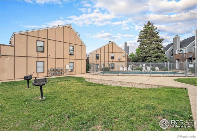 225 E 8th Ave Unit C-19, Longmont, CO 80504 - view of property's community featuring a swimming pool