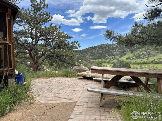 2302 W County Road 82e, Livermore, CO 80536 - view of patio with a mountain view