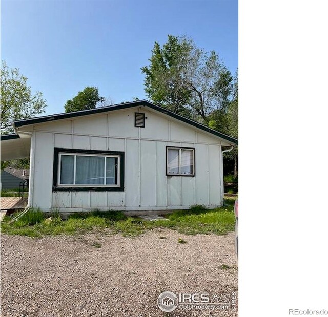 4809 Foothills Dr, Fort Collins, CO 80526 - view of side of home featuring board and batten siding