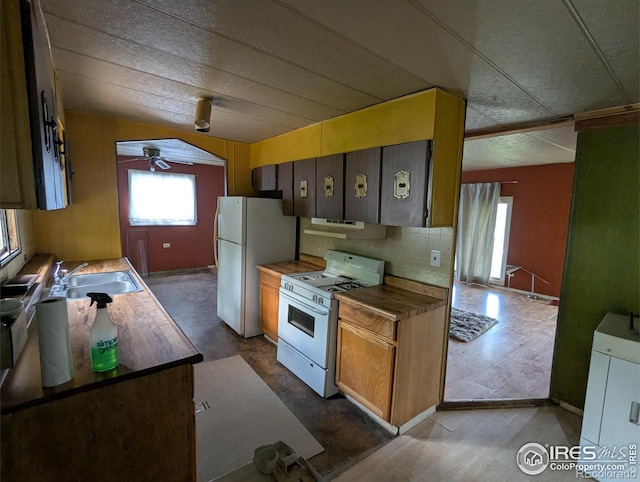 4809 Foothills Dr, Fort Collins, CO 80526 - kitchen featuring white appliances, a ceiling fan, a sink, decorative backsplash, and lofted ceiling