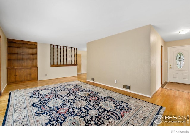 1409 Welch St, Fort Collins, CO 80524 - foyer featuring wood finished floors and baseboards