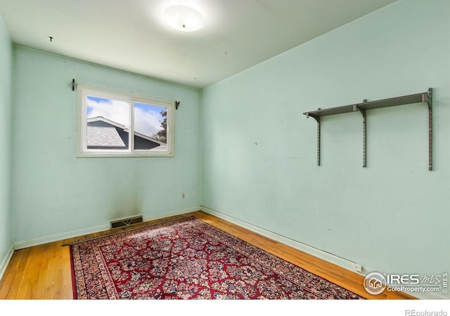 1409 Welch St, Fort Collins, CO 80524 - unfurnished room featuring wood finished floors and baseboards