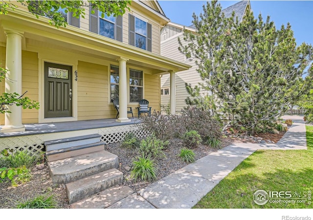 634 Homestead St, Lafayette, CO 80026 - property entrance featuring covered porch