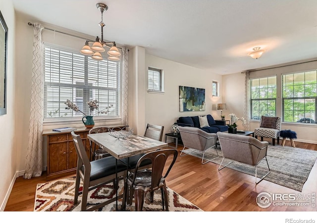 634 Homestead St, Lafayette, CO 80026 - dining area featuring light wood-style flooring, plenty of natural light, and baseboards