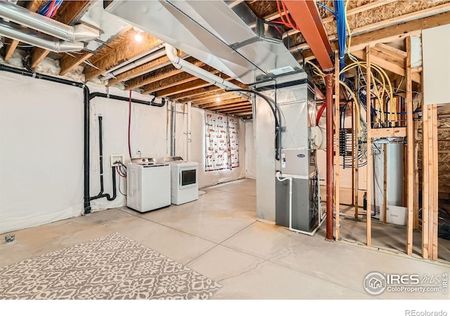 634 Homestead St, Lafayette, CO 80026 - unfinished below grade area featuring washing machine and clothes dryer and heating unit