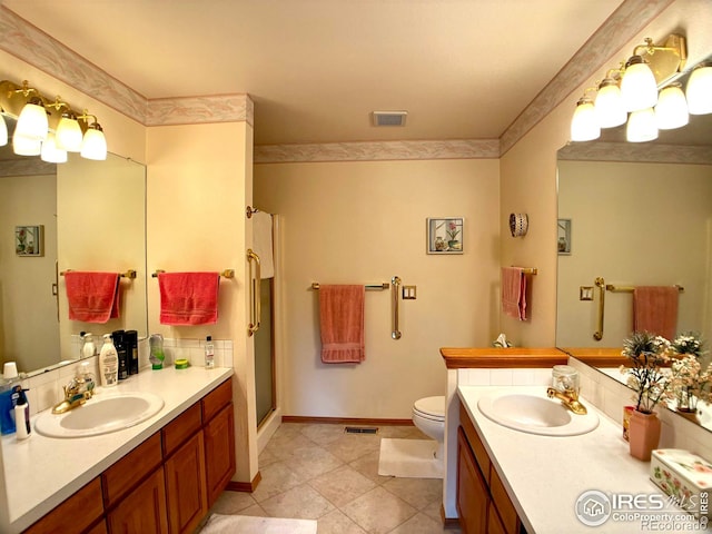 1515 Tulip Ct, Longmont, CO 80501 - full bathroom with toilet, vanity, a stall shower, and baseboards