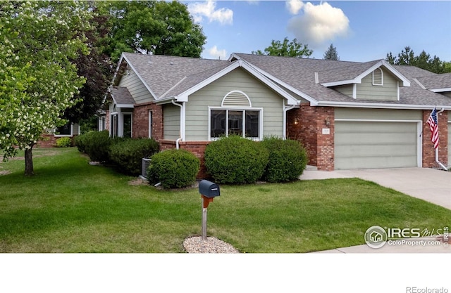 1515 Tulip Ct, Longmont, CO 80501 - view of front facade with brick siding, a front yard, an attached garage, concrete driveway, and a shingled roof