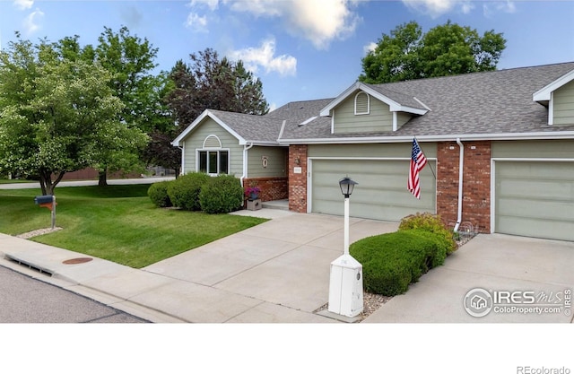 1515 Tulip Ct, Longmont, CO 80501 - view of front of home featuring brick siding, driveway, a shingled roof, a front lawn, and a garage
