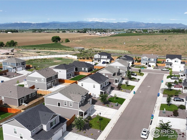 3657 Speedwell St, Wellington, CO 80549 - overview of rural landscape featuring mountains and nearby suburban area
