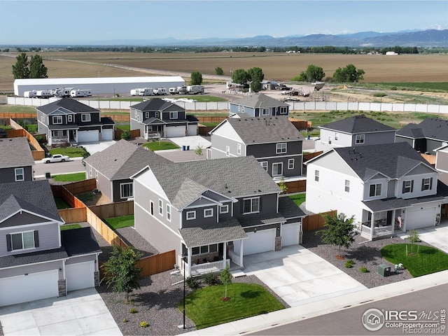 3657 Speedwell St, Wellington, CO 80549 - aerial perspective of suburban area featuring a mountain backdrop