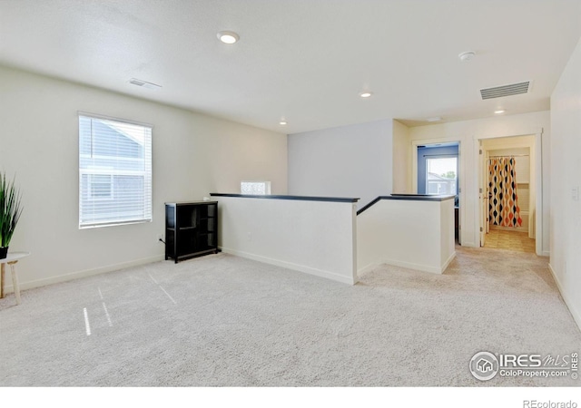 3657 Speedwell St, Wellington, CO 80549 - empty room with light carpet, a smoke detector, and recessed lighting