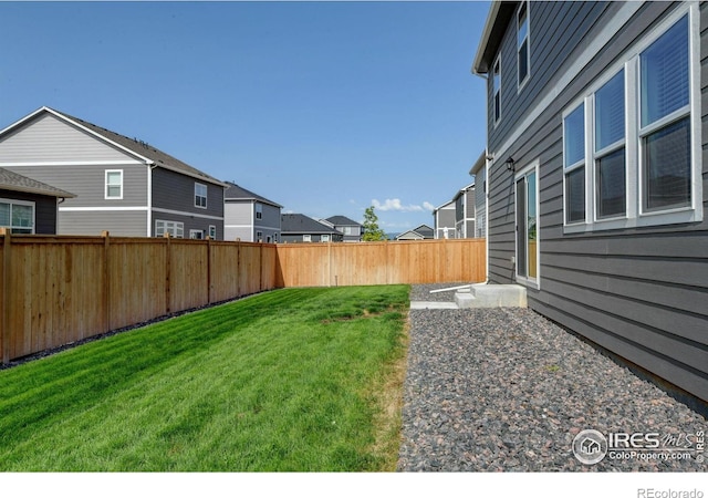 3657 Speedwell St, Wellington, CO 80549 - fenced backyard with a residential view