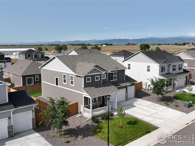 3657 Speedwell St, Wellington, CO 80549 - aerial view of residential area with mountains