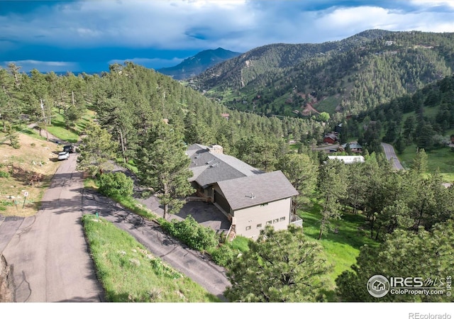 142 Meadowlook Way, Boulder, CO 80304 - view of mountain background with a heavily wooded area