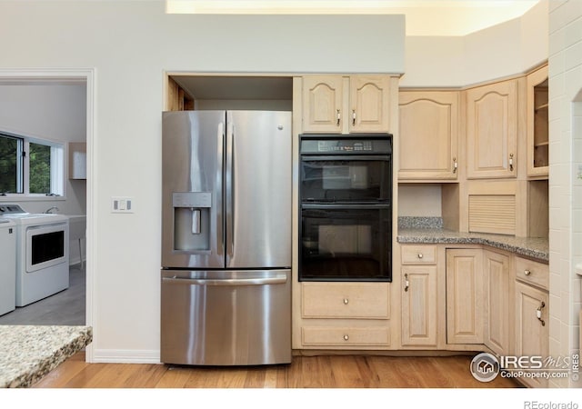 142 Meadowlook Way, Boulder, CO 80304 - kitchen featuring stainless steel fridge, independent washer and dryer, light brown cabinetry, and light wood-style flooring