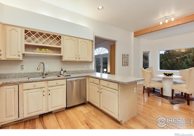 142 Meadowlook Way, Boulder, CO 80304 - kitchen with stainless steel dishwasher, a sink, light wood-style flooring, a peninsula, and light stone countertops