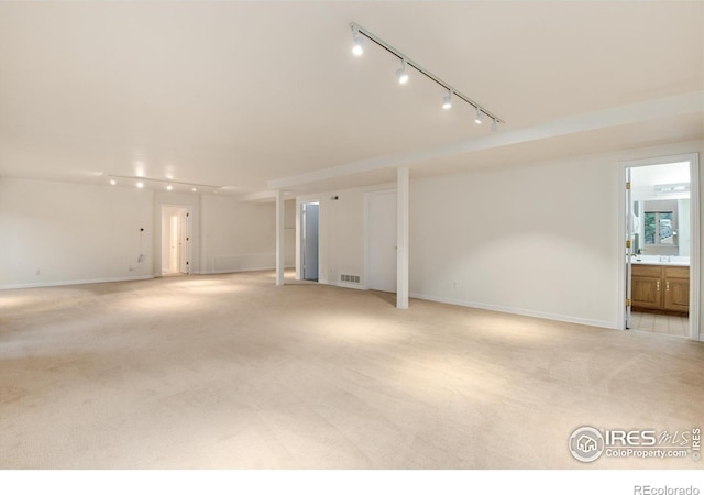 142 Meadowlook Way, Boulder, CO 80304 - empty room featuring track lighting, light carpet, and baseboards