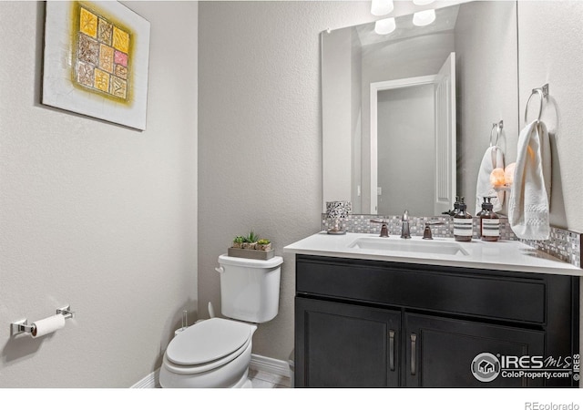 3075 Blue Mountain Dr, Broomfield, CO 80023 - bathroom featuring toilet and vanity