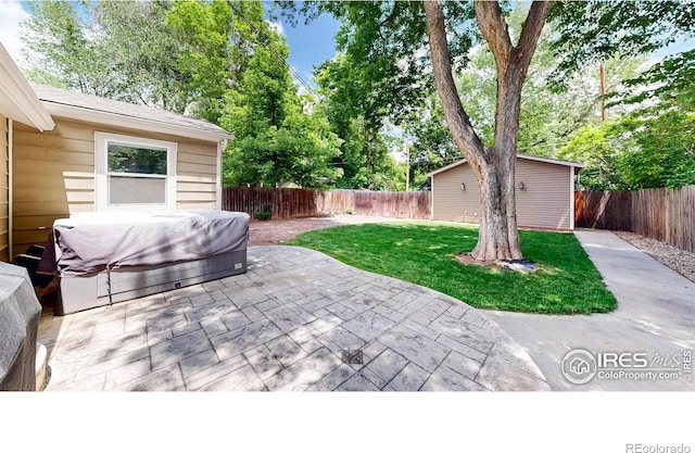 904 N Jefferson Ave, Loveland, CO 80537 - view of patio / terrace with a hot tub