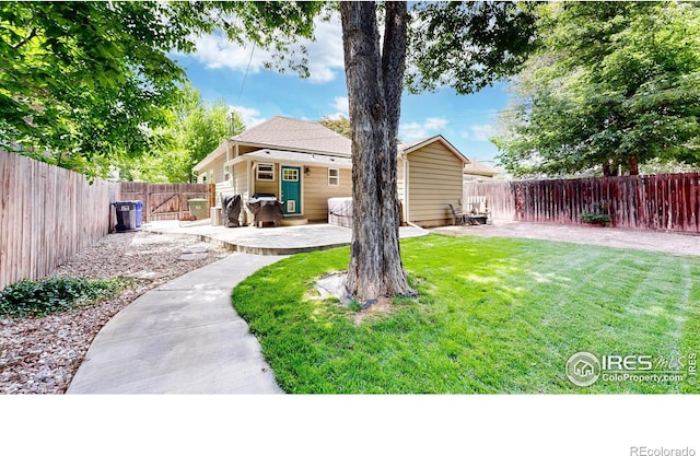 904 N Jefferson Ave, Loveland, CO 80537 - view of yard featuring a patio area