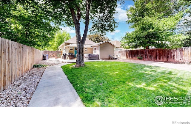 904 N Jefferson Ave, Loveland, CO 80537 - view of yard featuring a patio